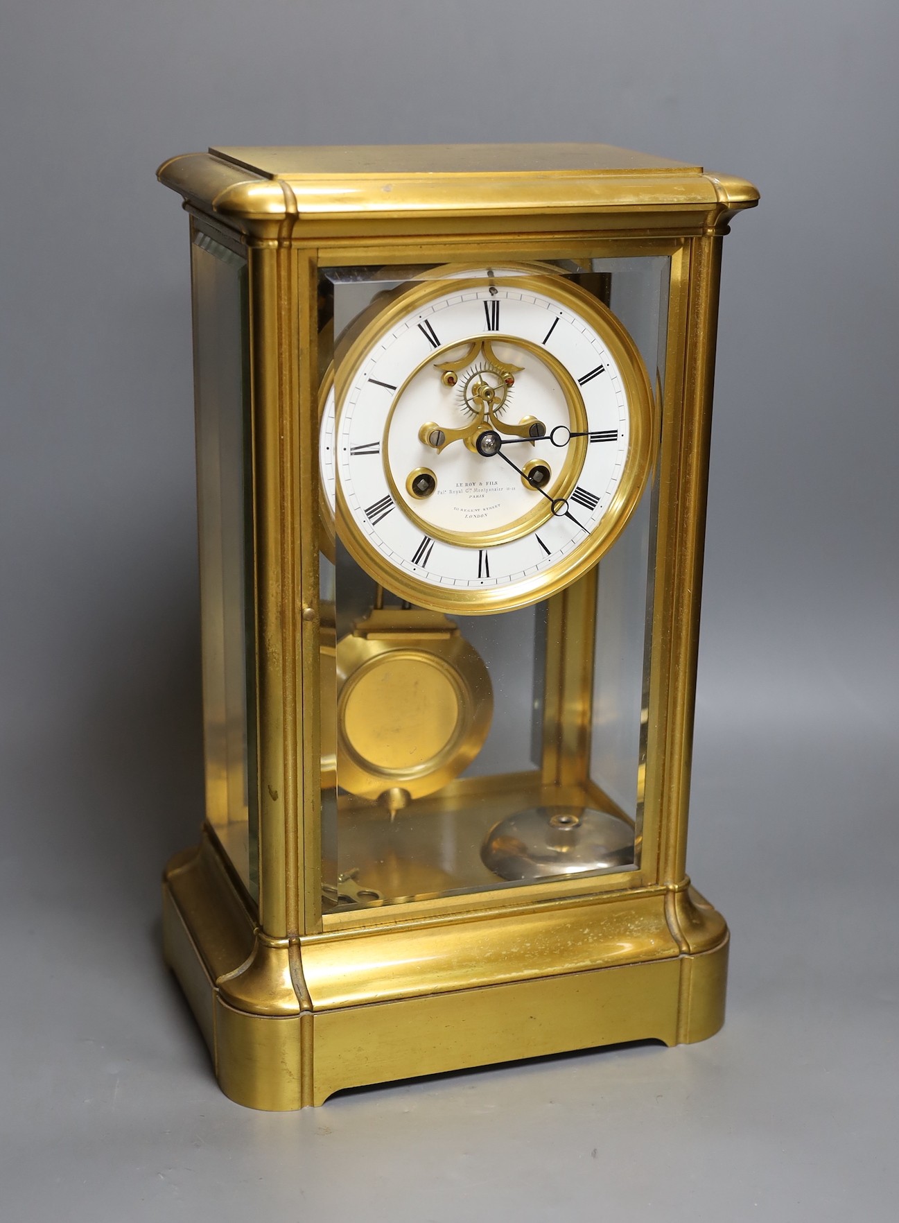 A large gilt framed four glass mantel clock by Le Roy & Fils of London. 36cm tall
